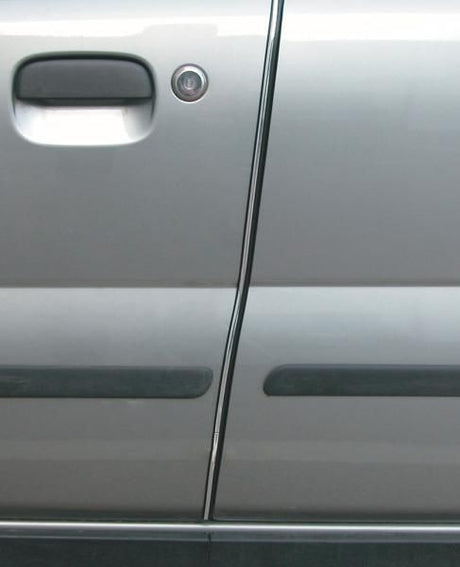 Pegatinas cromadas protectoras de puerta Cora de 50 cm